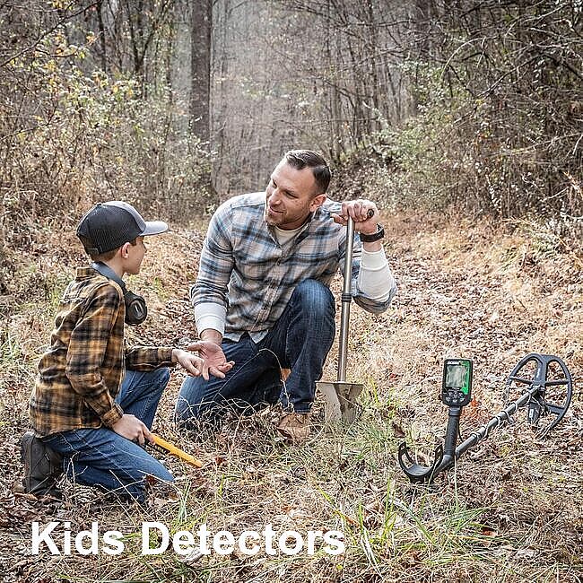 Father and son metal detecting